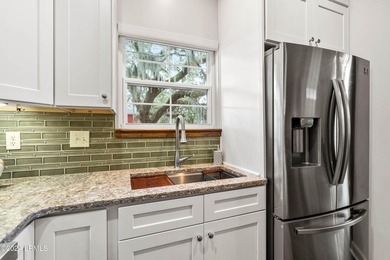 Beautifully upgraded, modern coastal home with new roof, new - photo 21