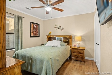 Discover this immaculate 2nd-tier ranch in Linn Creek, boasting - photo 22