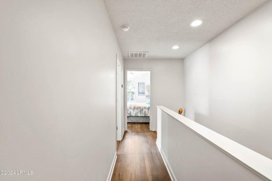 Beautifully upgraded, modern coastal home with new roof, new - photo 26