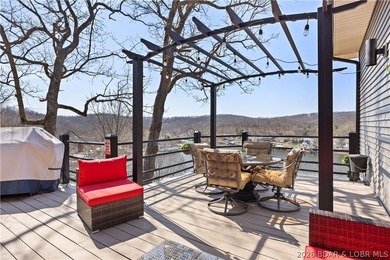 Discover this immaculate 2nd-tier ranch in Linn Creek, boasting - photo 32