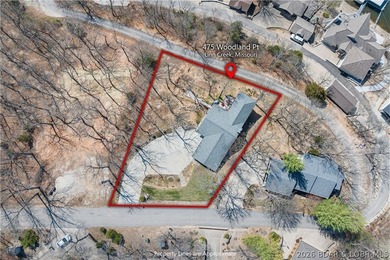 Discover this immaculate 2nd-tier ranch in Linn Creek, boasting - photo 43