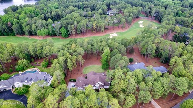 Welcome to 370 Lake Dornoch Drive, an exquisite 6,251 heated sq - photo 8