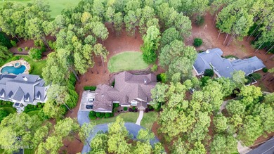 Welcome to 370 Lake Dornoch Drive, an exquisite 6,251 heated sq - photo 9