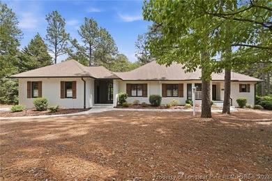 Exceptional home nestled on over one acre within the exclusive - photo 1