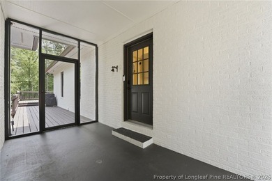 Exceptional home nestled on over one acre within the exclusive - photo 4