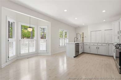 Exceptional home nestled on over one acre within the exclusive - photo 7