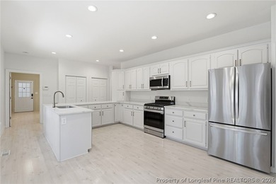Exceptional home nestled on over one acre within the exclusive - photo 8