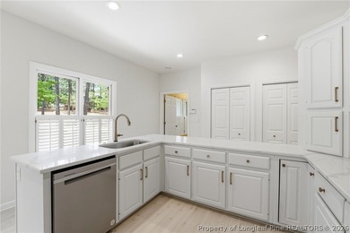 Exceptional home nestled on over one acre within the exclusive - photo 9