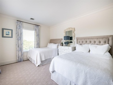 Set along the coveted shores of Dune Road in Quogue, this - photo 18