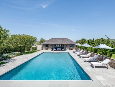Set along the coveted shores of Dune Road in Quogue, this - photo 22