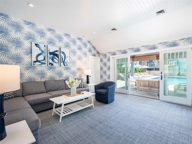 Set along the coveted shores of Dune Road in Quogue, this - photo 25