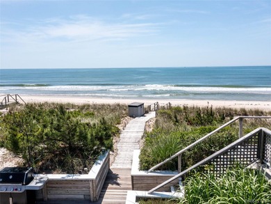 Set along the coveted shores of Dune Road in Quogue, this - photo 31