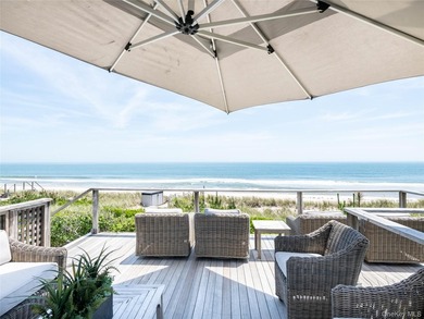 Set along the coveted shores of Dune Road in Quogue, this - photo 32