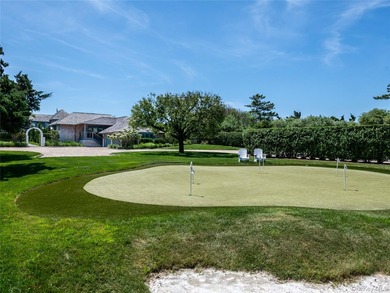 Set along the coveted shores of Dune Road in Quogue, this - photo 33