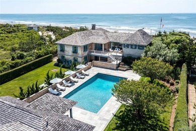 Set along the coveted shores of Dune Road in Quogue, this - photo 34