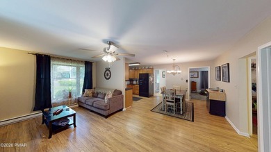 Nestled near Peck's Pond, this 2 bedroom ranch home sits on .6 - photo 4