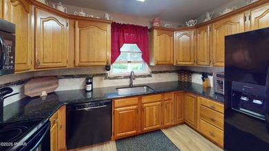 Nestled near Peck's Pond, this 2 bedroom ranch home sits on .6 - photo 8