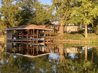 Pack Your Bags and Start Enjoying This Lakefront Home! - Lake Home Sale Pending in Girard, Illinois