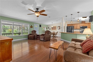 Tucked away on a beautiful wooded 1-acre waterfront lot in the - photo 11