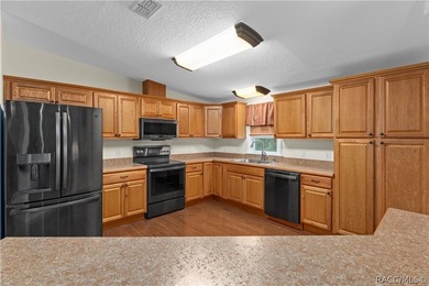 Tucked away on a beautiful wooded 1-acre waterfront lot in the - photo 13