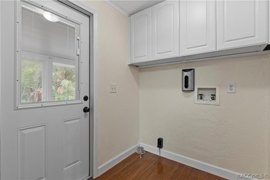 Tucked away on a beautiful wooded 1-acre waterfront lot in the - photo 16