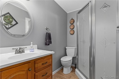 Tucked away on a beautiful wooded 1-acre waterfront lot in the - photo 17
