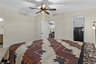 Tucked away on a beautiful wooded 1-acre waterfront lot in the - photo 18
