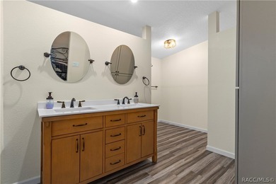 Tucked away on a beautiful wooded 1-acre waterfront lot in the - photo 19