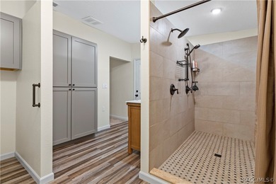 Tucked away on a beautiful wooded 1-acre waterfront lot in the - photo 20