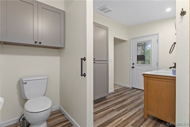Tucked away on a beautiful wooded 1-acre waterfront lot in the - photo 21