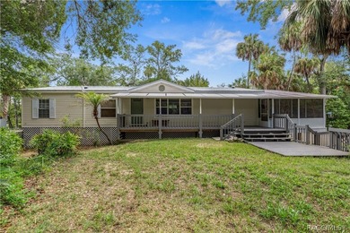 Tucked away on a beautiful wooded 1-acre waterfront lot in the - photo 29