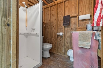 Tucked away on a beautiful wooded 1-acre waterfront lot in the - photo 36