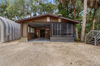 Tucked away on a beautiful wooded 1-acre waterfront lot in the - photo 38
