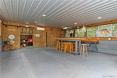 Tucked away on a beautiful wooded 1-acre waterfront lot in the - photo 39