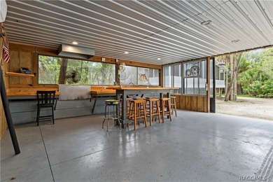 Tucked away on a beautiful wooded 1-acre waterfront lot in the - photo 40