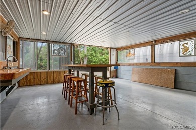 Tucked away on a beautiful wooded 1-acre waterfront lot in the - photo 41