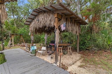 Tucked away on a beautiful wooded 1-acre waterfront lot in the - photo 44