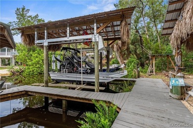 Tucked away on a beautiful wooded 1-acre waterfront lot in the - photo 45