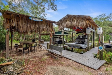 Tucked away on a beautiful wooded 1-acre waterfront lot in the - photo 46
