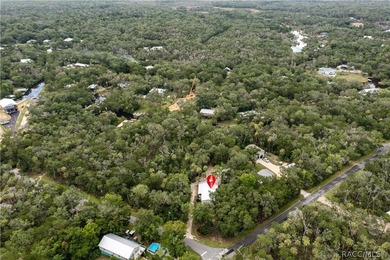 Tucked away on a beautiful wooded 1-acre waterfront lot in the - photo 49
