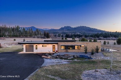 Set on nearly nine private acres in The Ranch at Riverbend, this - photo 2