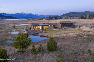 Set on nearly nine private acres in The Ranch at Riverbend, this - photo 3