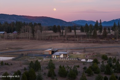 Set on nearly nine private acres in The Ranch at Riverbend, this - photo 4