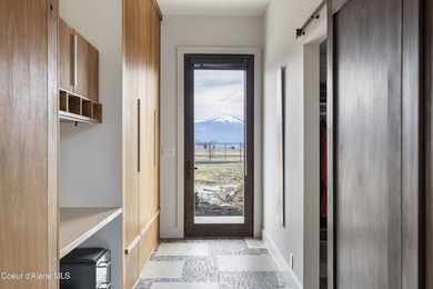 Set on nearly nine private acres in The Ranch at Riverbend, this - photo 9