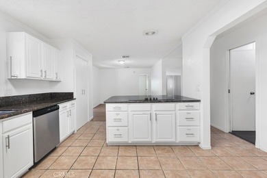 Welcome to this beautifully maintained 4-bedroom, 2-bathroom - photo 10