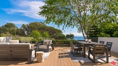 Privately set within a gated coastal enclave, 28022 Sea Lane - photo 2