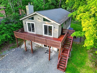 Welcome to this spacious and inviting 4-bedroom, 2-bath home - photo 1