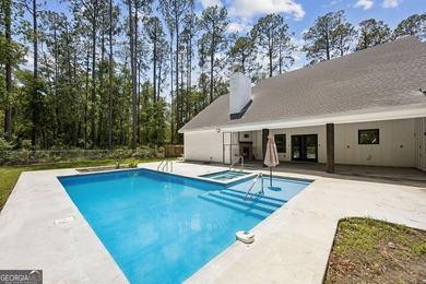 This custom-built home is situated on approximately 3 acres and - photo 2