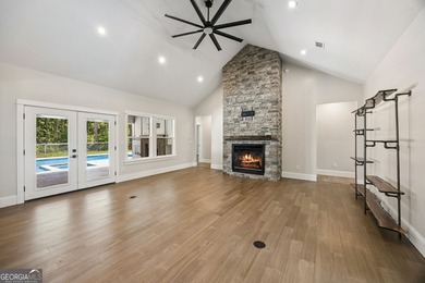 This custom-built home is situated on approximately 3 acres and - photo 3