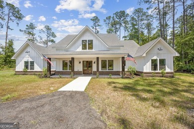 This custom-built home is situated on approximately 3 acres and - photo 8